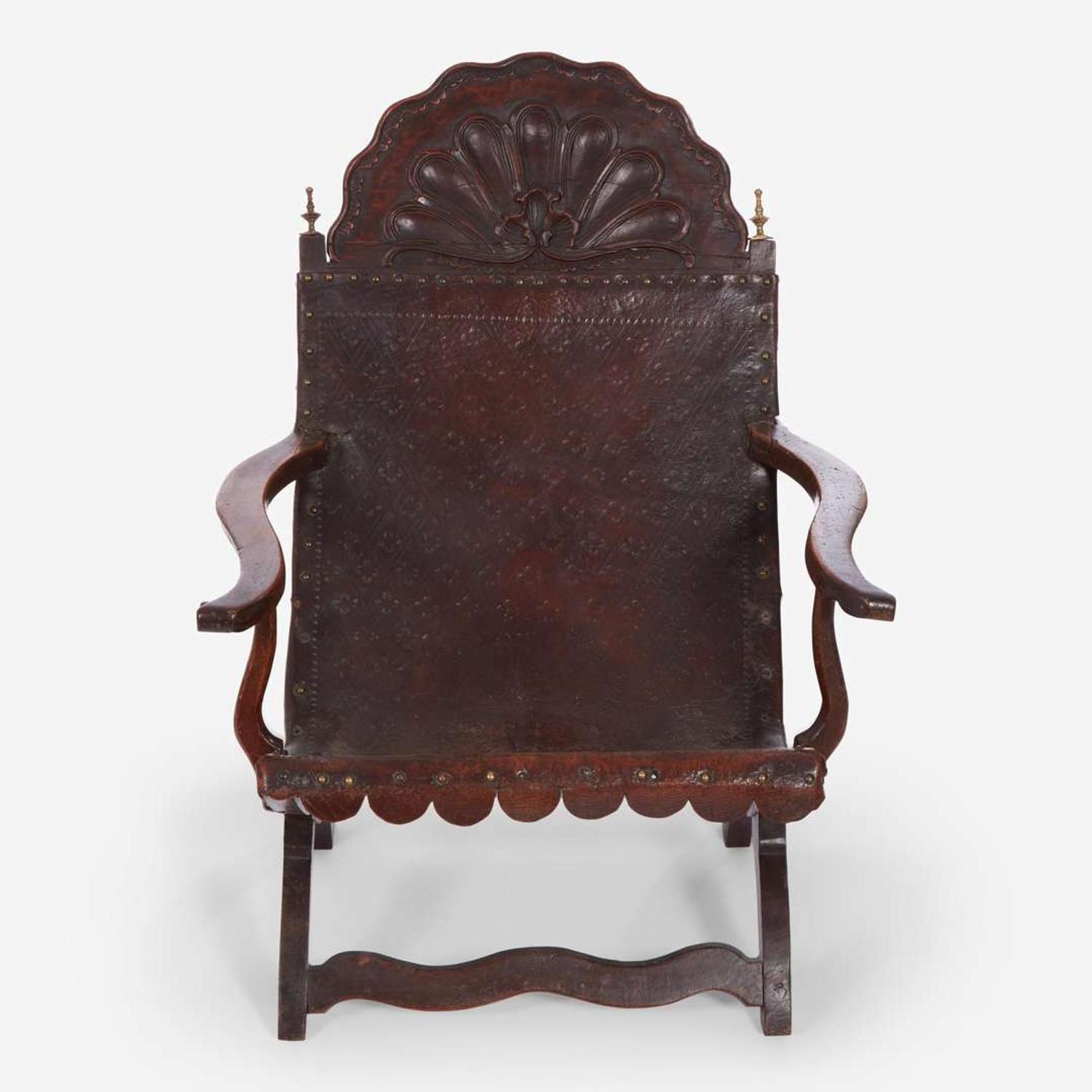 A carved mahogany and tooled leather Campeche chair Mexico, late 18th / early 19th century