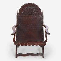 A carved mahogany and tooled leather Campeche chair Mexico, late 18th / early 19th century