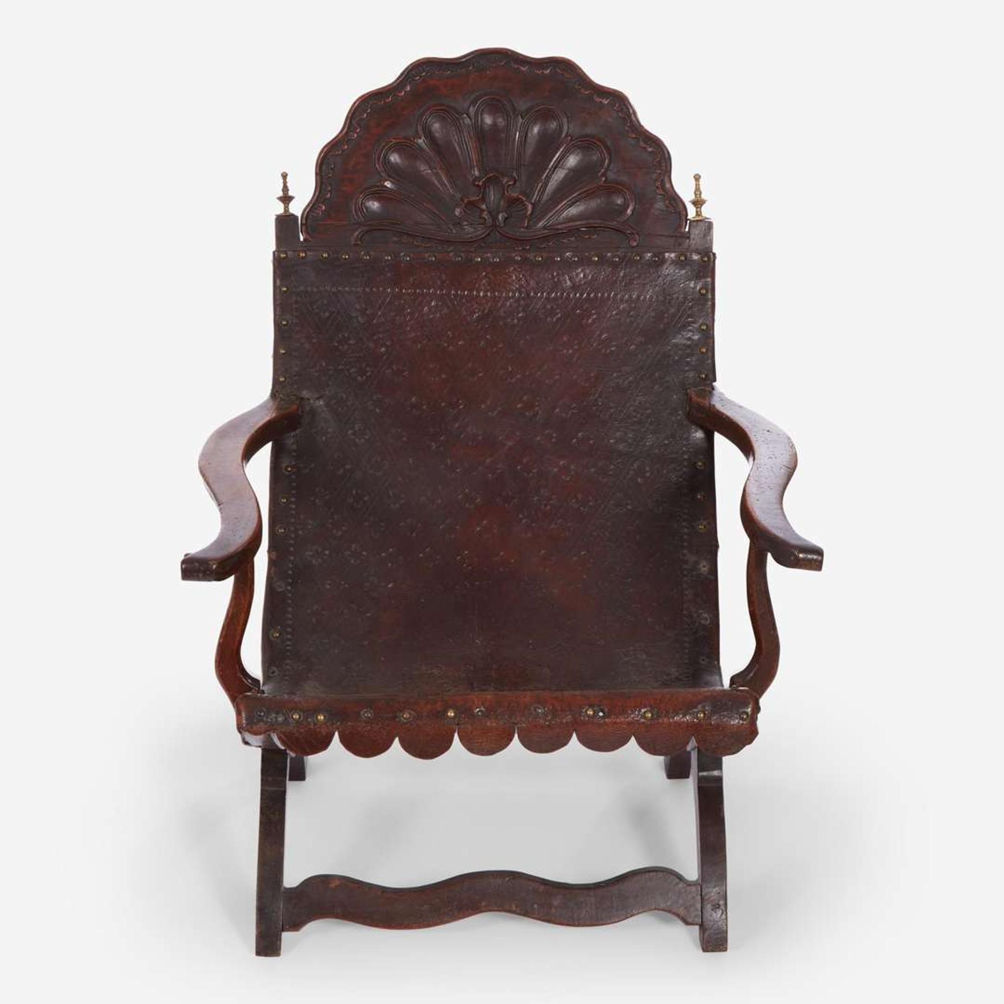 A carved mahogany and tooled leather Campeche chair Mexico, late 18th / early 19th century