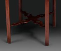 A Late Chippendale Carved and Figured Mahogany Stretcher-Base Pembroke Table