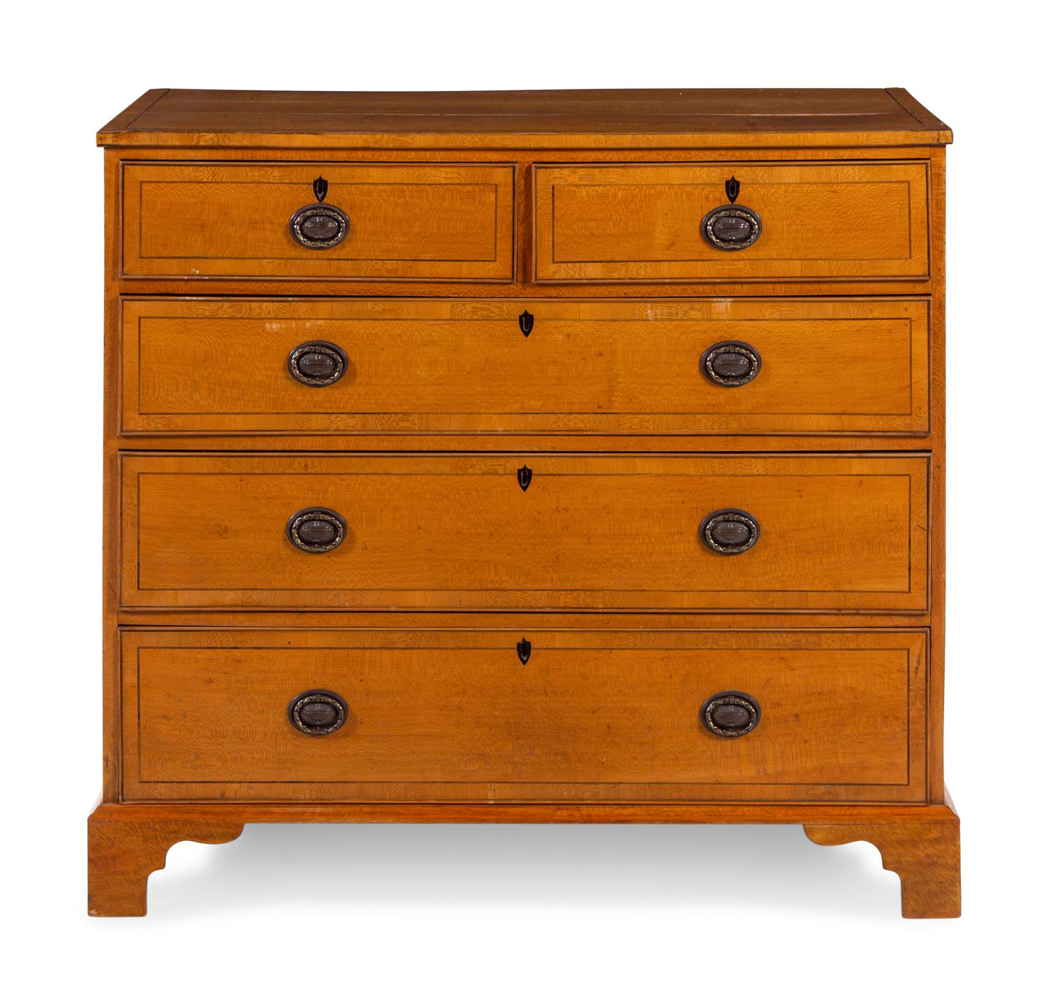 A George III Adam Style Ebony Inlaid Satinwood Chest of Drawers