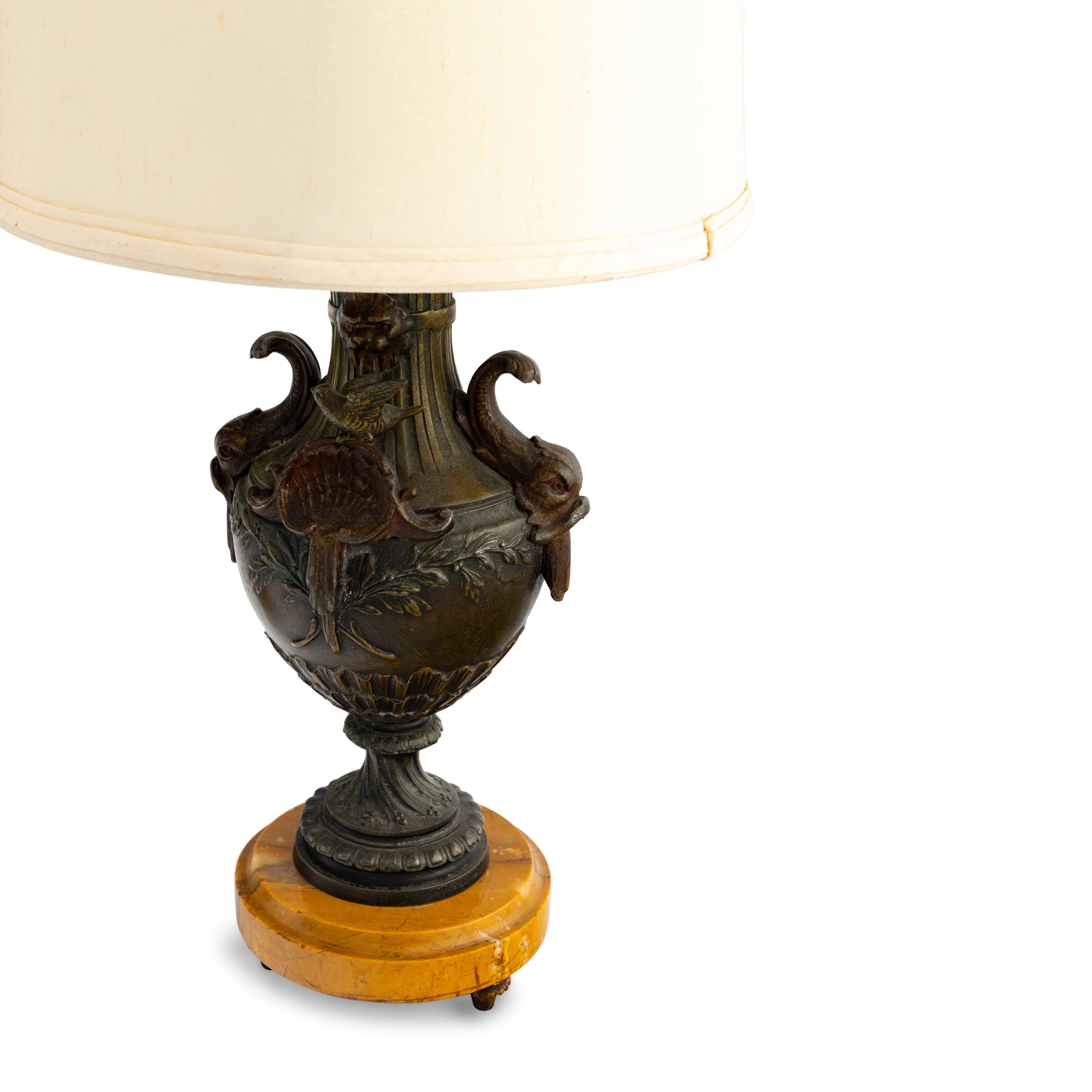 A Pair of French Cast Metal and Marble Lamps