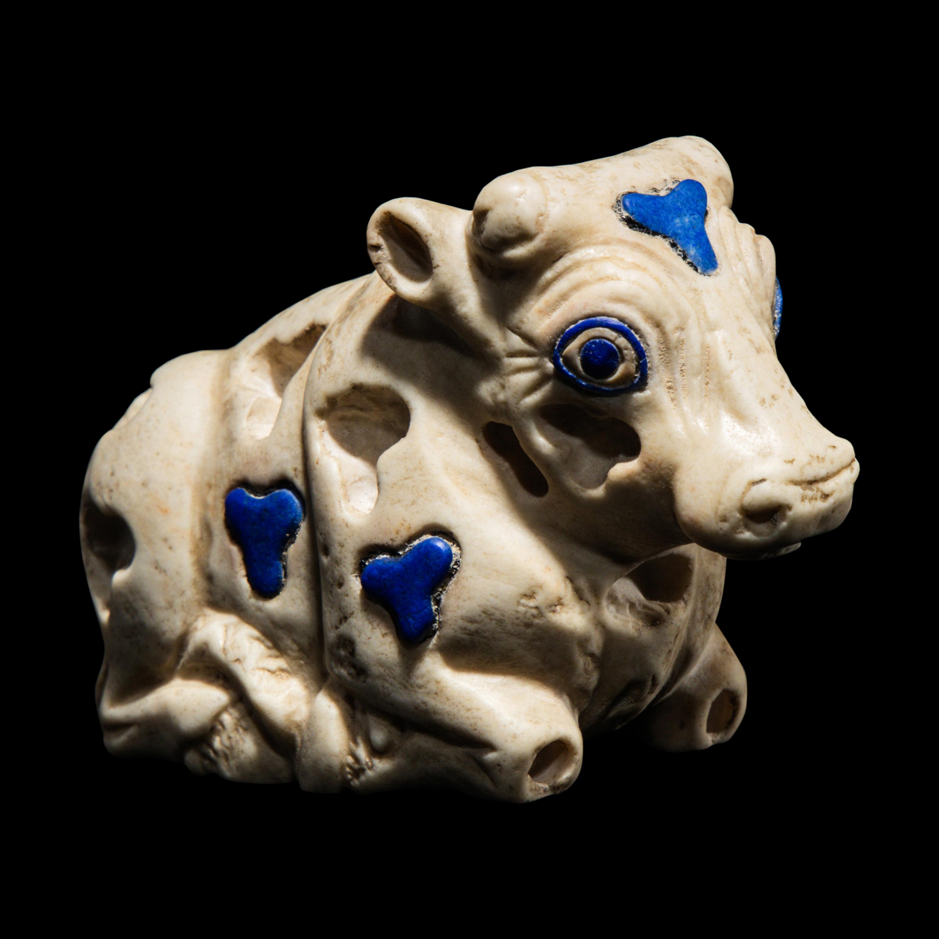 A Mesopotamian Marble and Lapis Lazuli Inlay Recumbent Calf