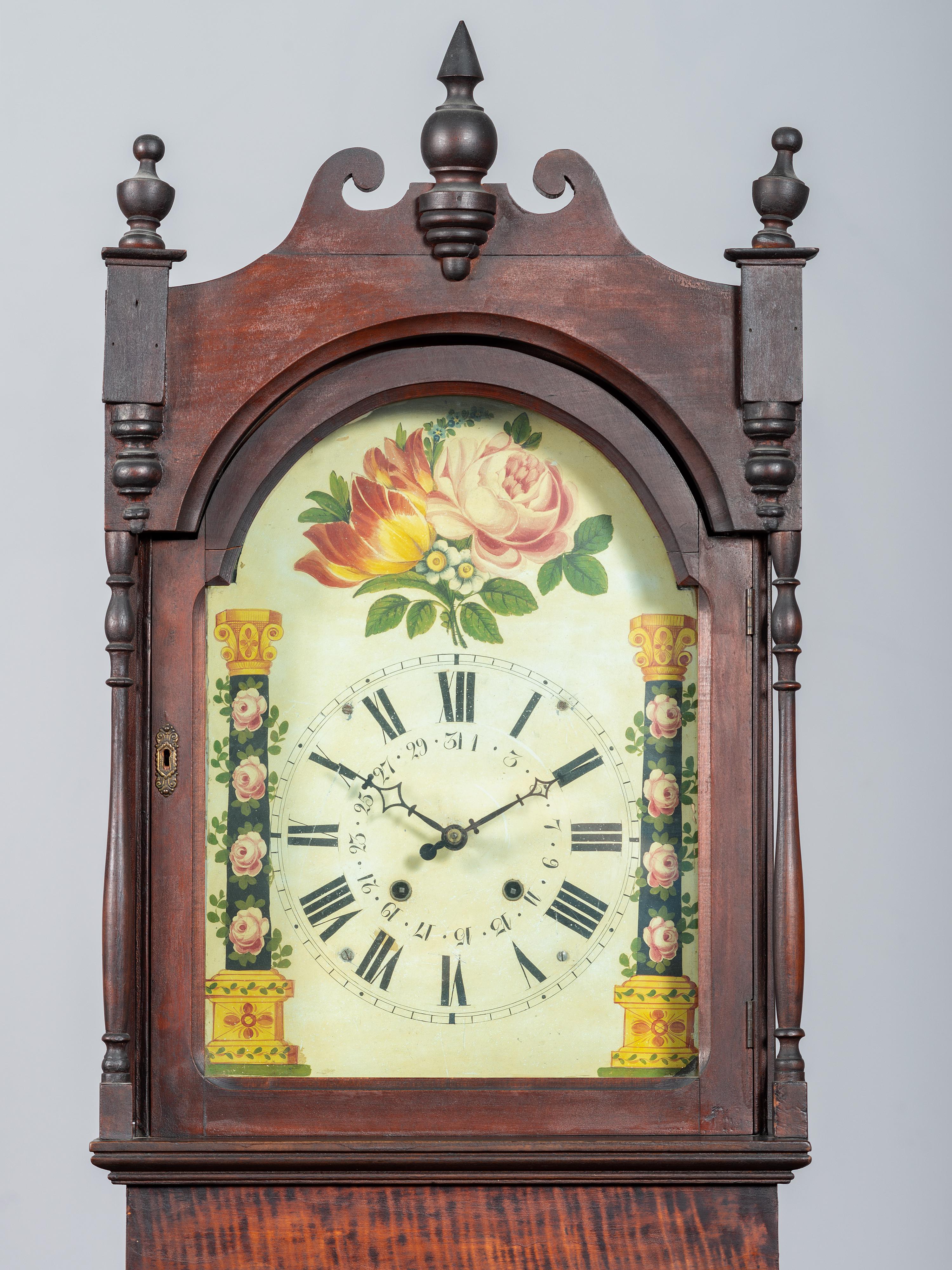A Chippendale Cherrywood and Tiger Maple Tall Case Clock