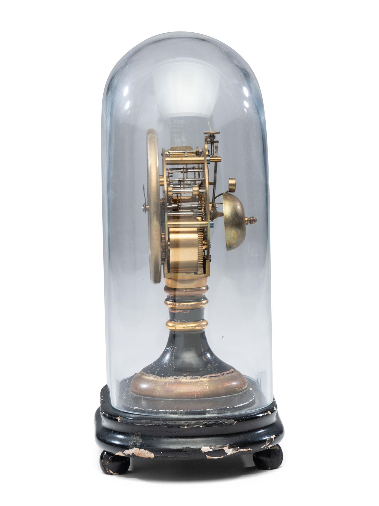 An Ebonized and Parcel Gilt Mantel Clock