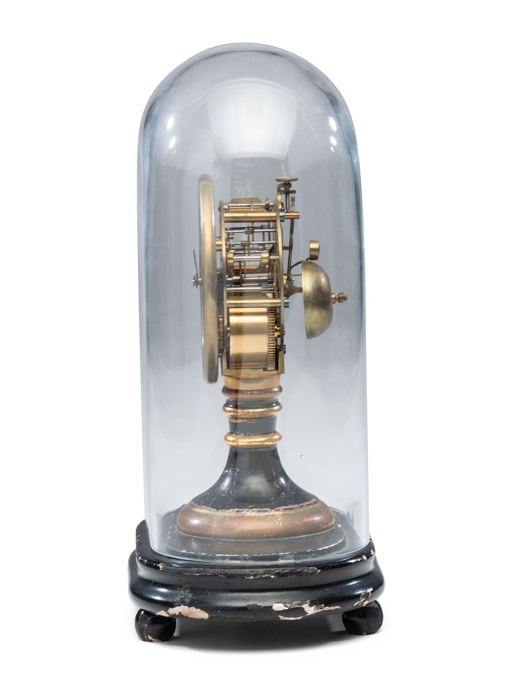 An Ebonized and Parcel Gilt Mantel Clock