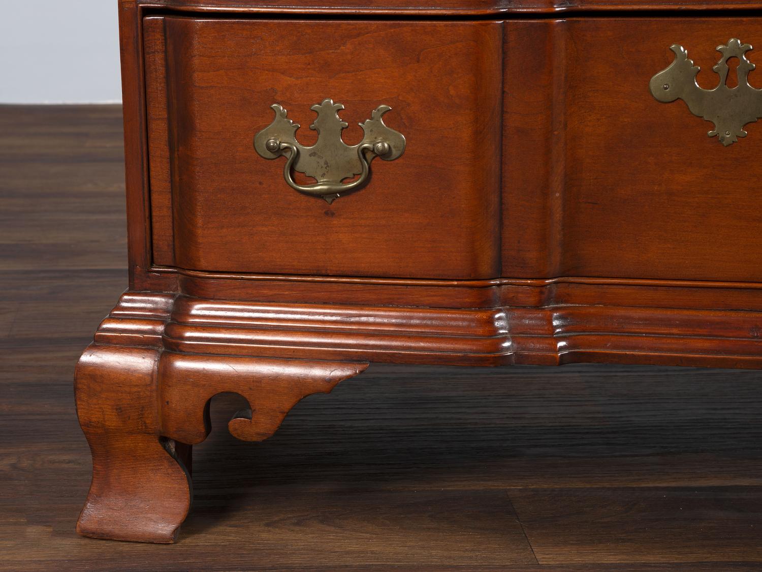 A Chippendale Shell-and-Block Carved Cherrywood Chest of Drawers