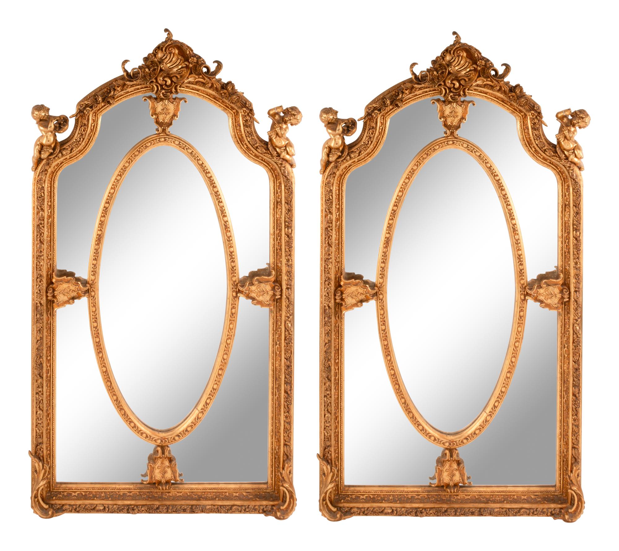 A Pair of Régence Style Gilt Composition Mirrors