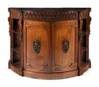 A Continental Carved Oak Demilune Cabinet