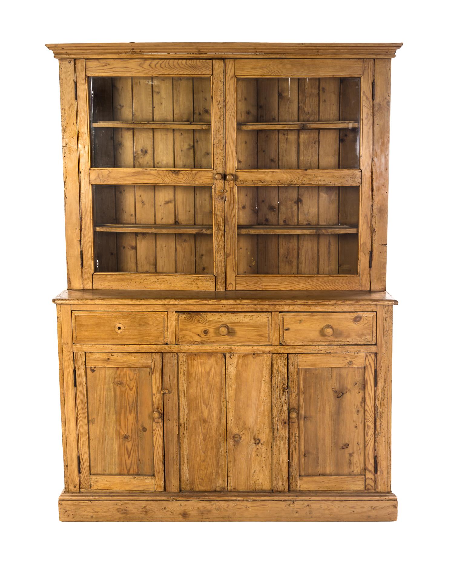 An Irish Pine Stepback Cupboard, Height 86 1/4 x width 62 x depth 17 inches.