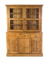 An Irish Pine Stepback Cupboard, Height 86 1/4 x width 62 x depth 17 inches.