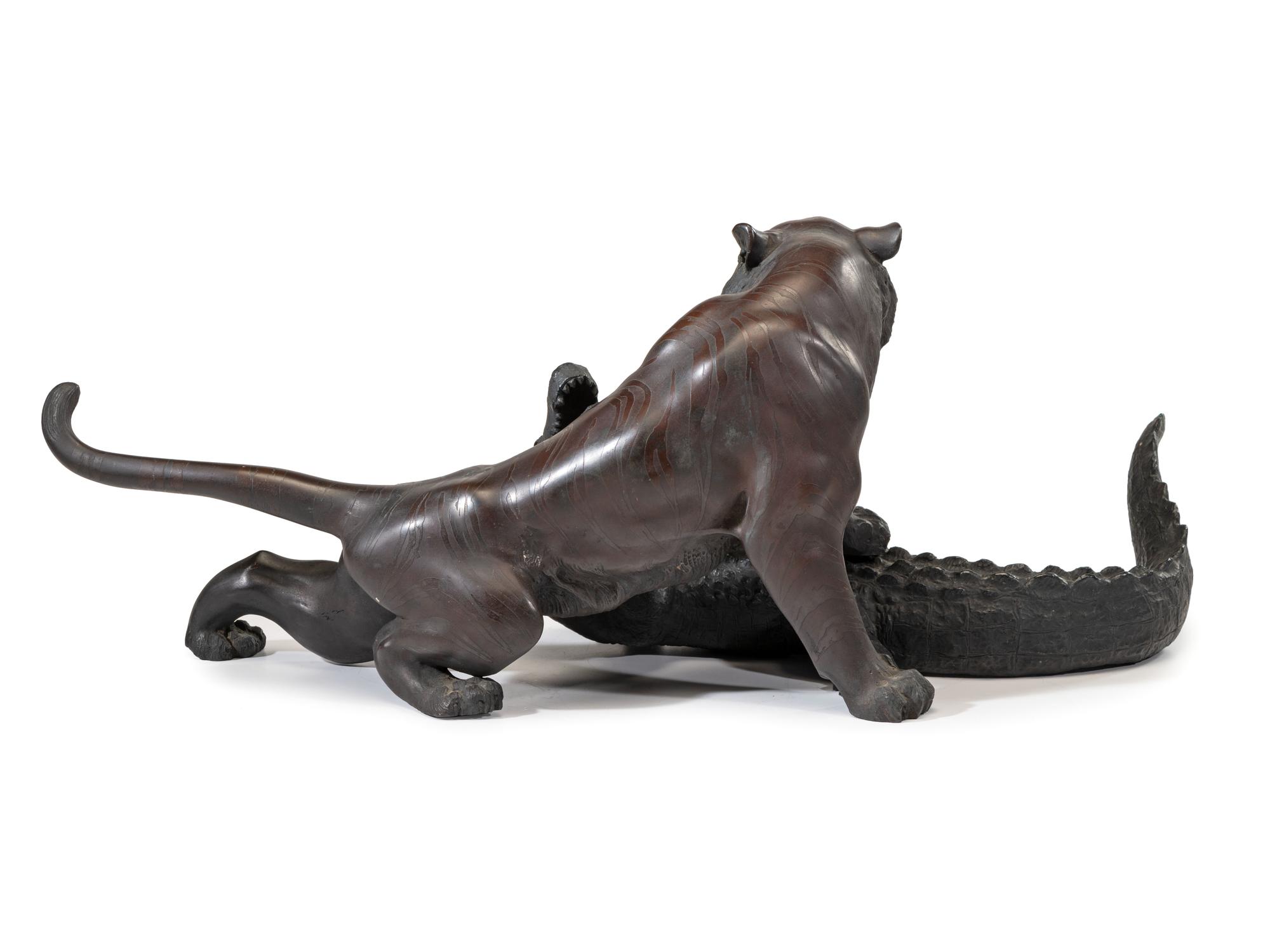 A Japanese Meiji Bronze Tiger and Alligator Sculptural Group