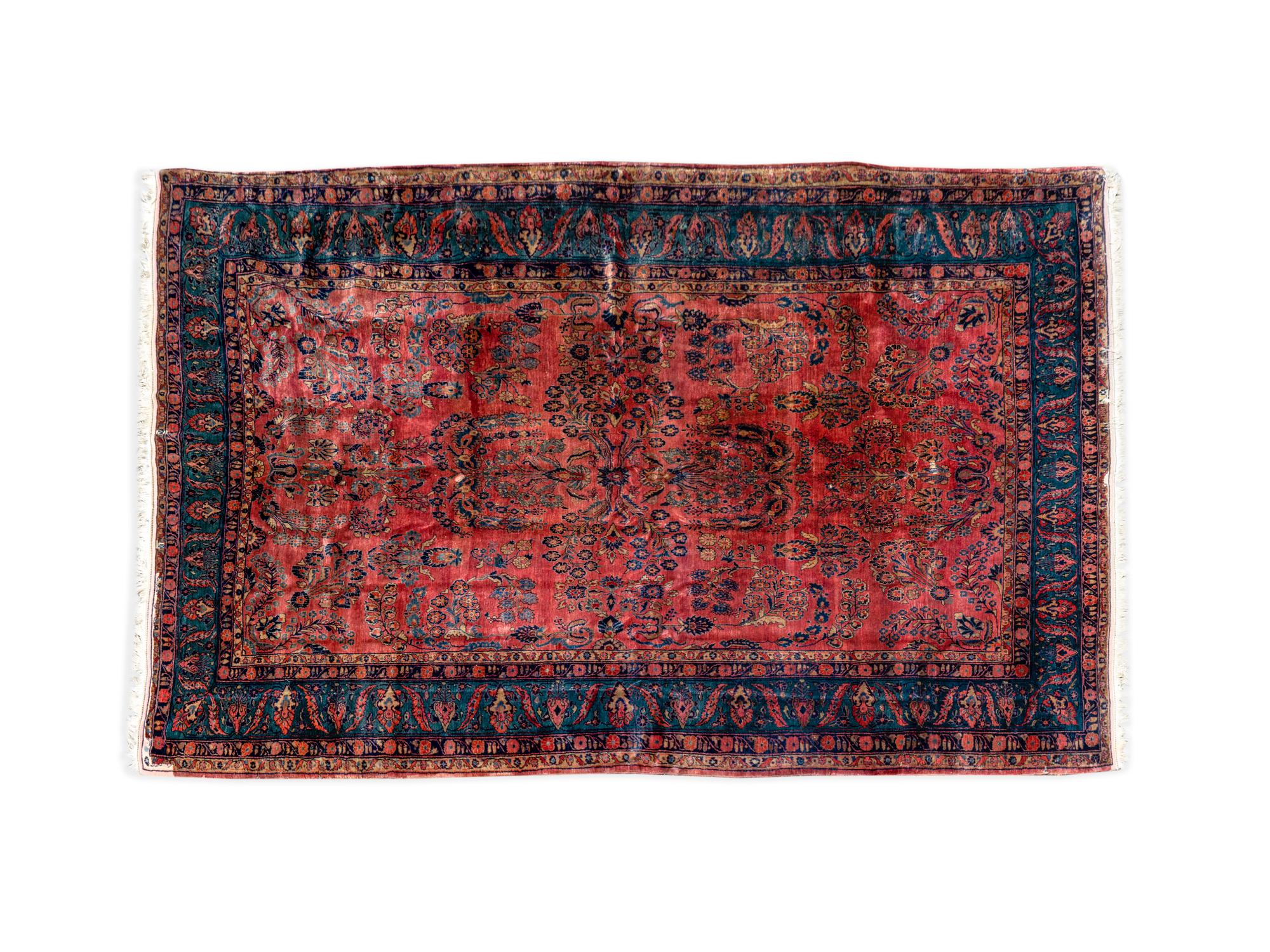 A Sarouk Wool Rug — CIRCA 1920