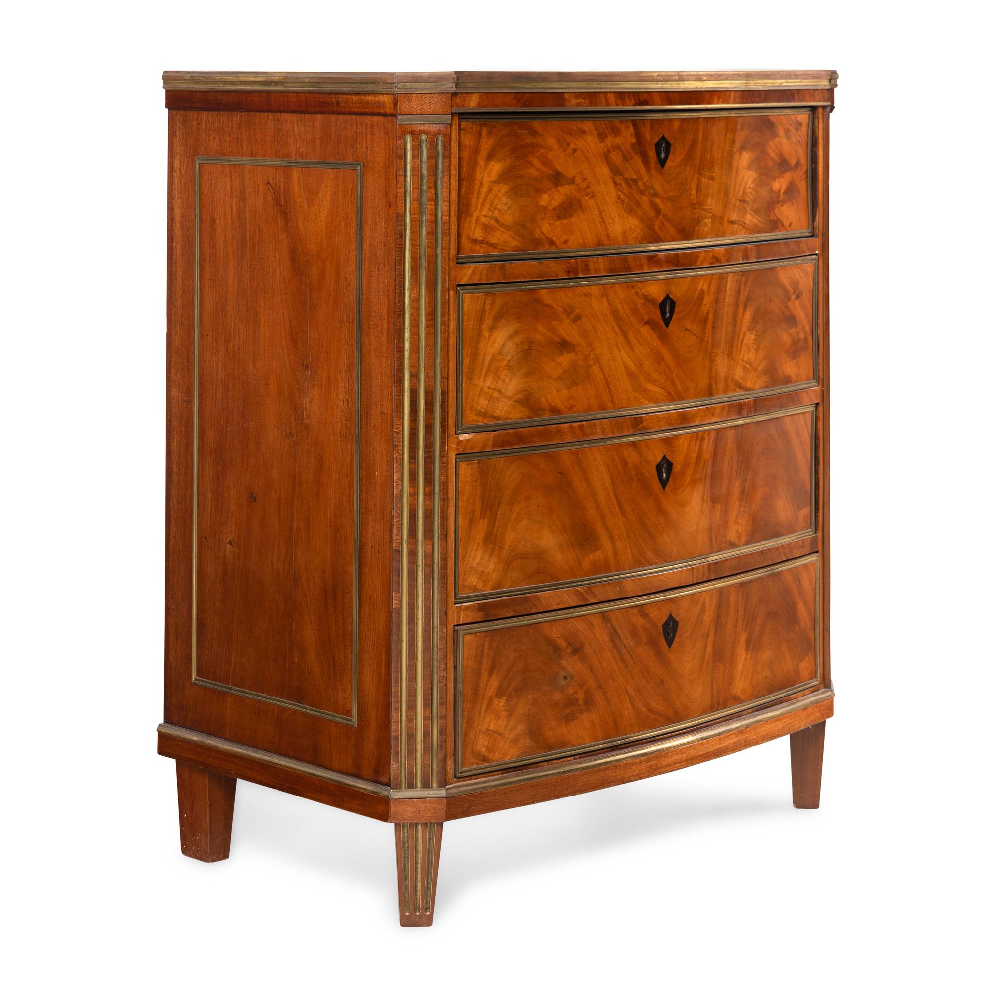A Russian or Baltic Neoclassical Brass Mounted Mahogany Chest of Drawers