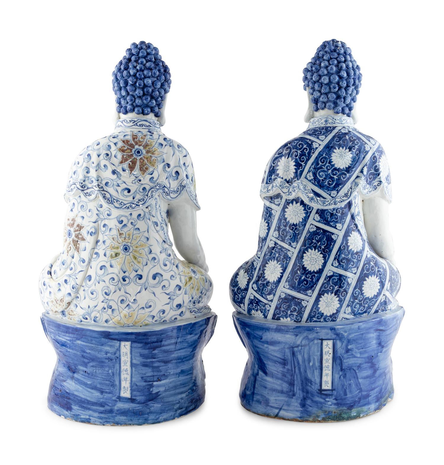 Two Blue and White Glazed Seated Figures
