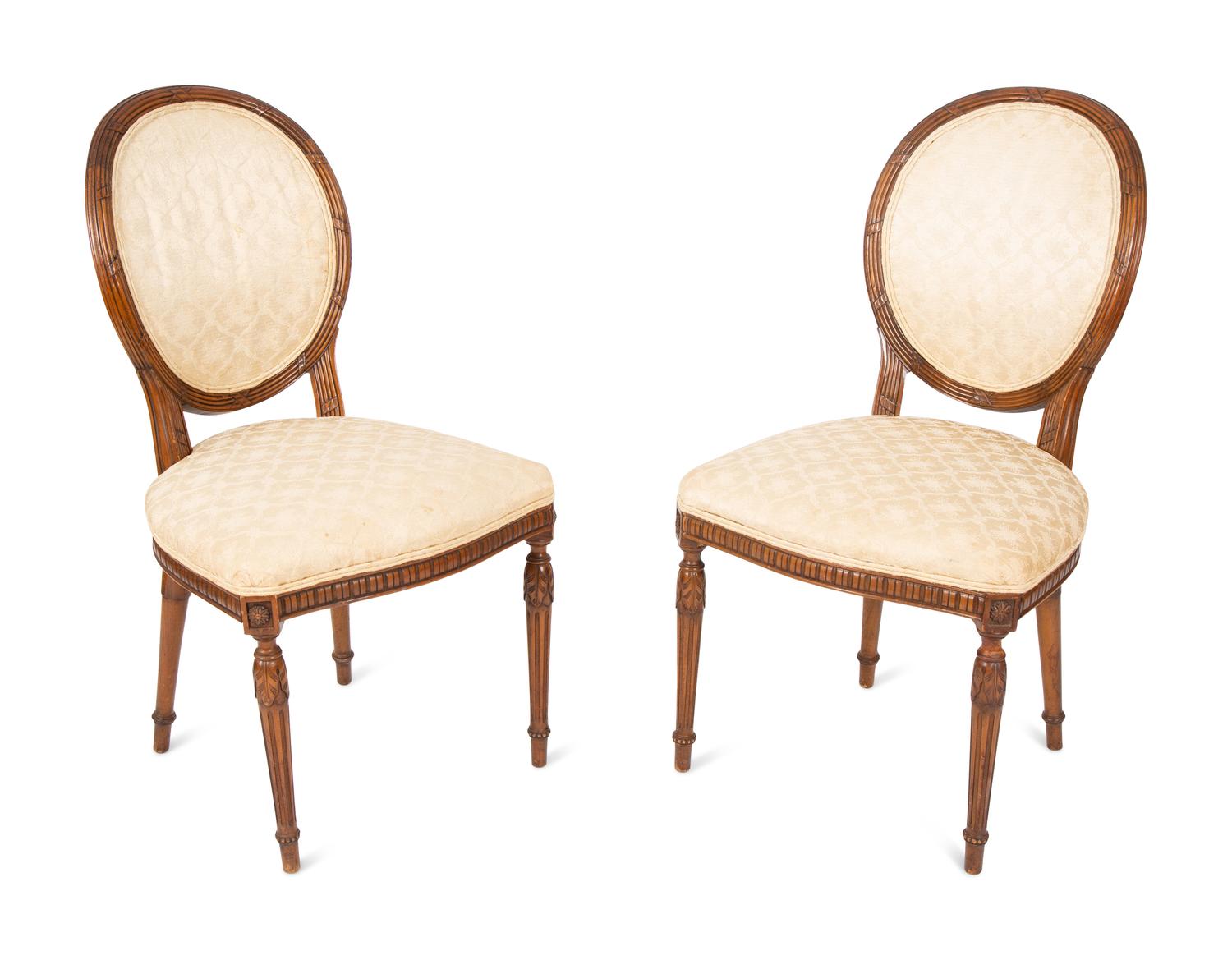 A Set of Four Louis XVI Style Side Chairs