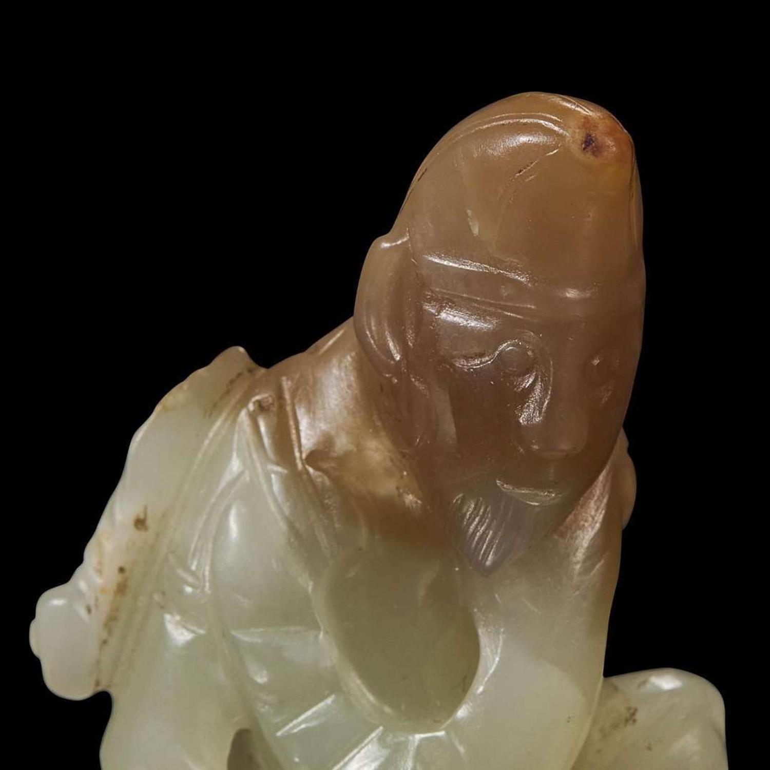 A rare Chinese jade carving of a foreigner and mythical beast 胡人戏兽玉雕 Tang dynasty or later ????