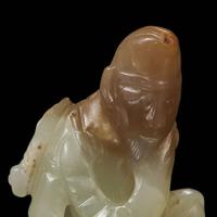 A rare Chinese jade carving of a foreigner and mythical beast 胡人戏兽玉雕 Tang dynasty or later ????