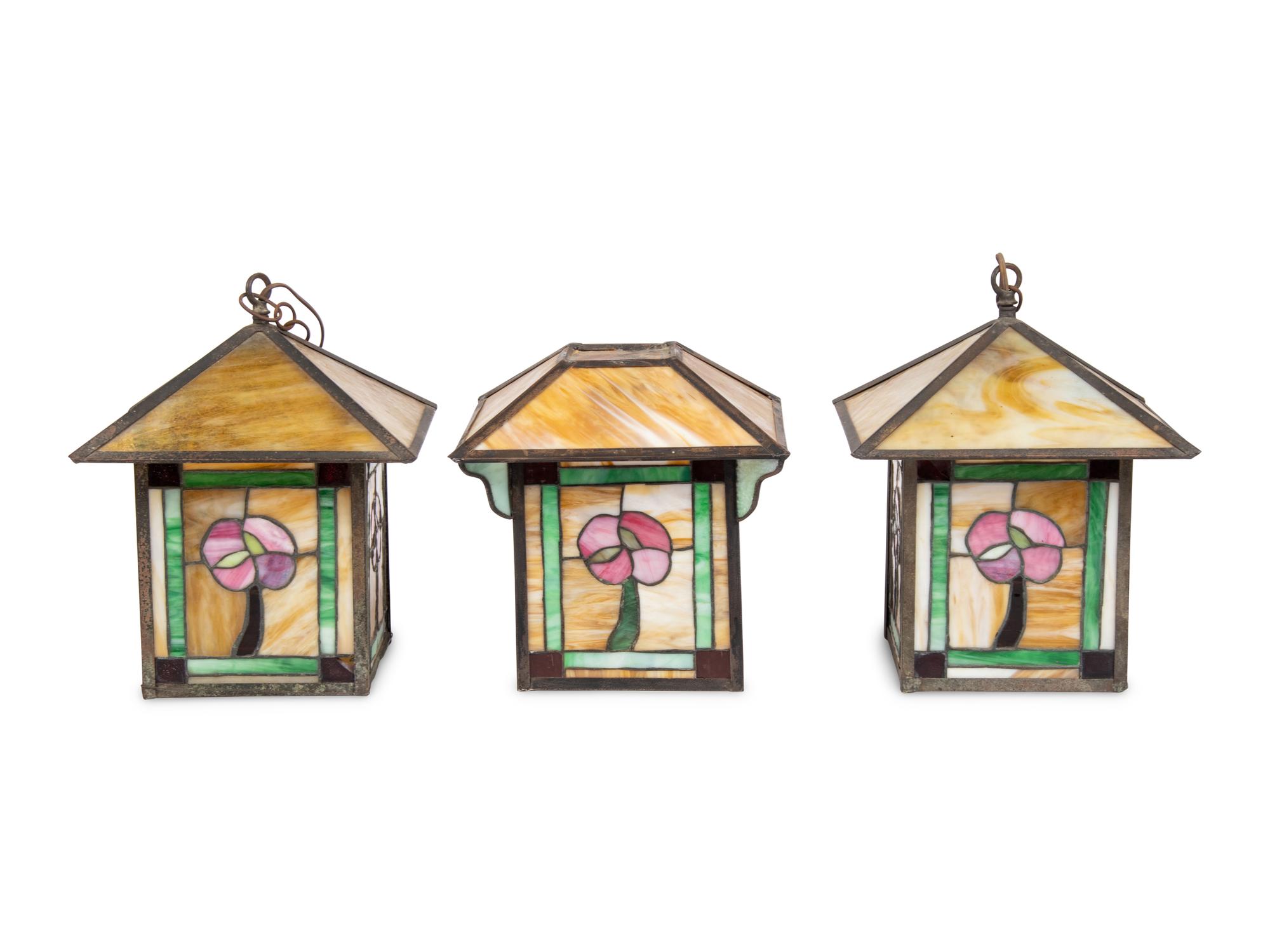 A Pair of Arts and Crafts Leaded Glass Pendant Lamps