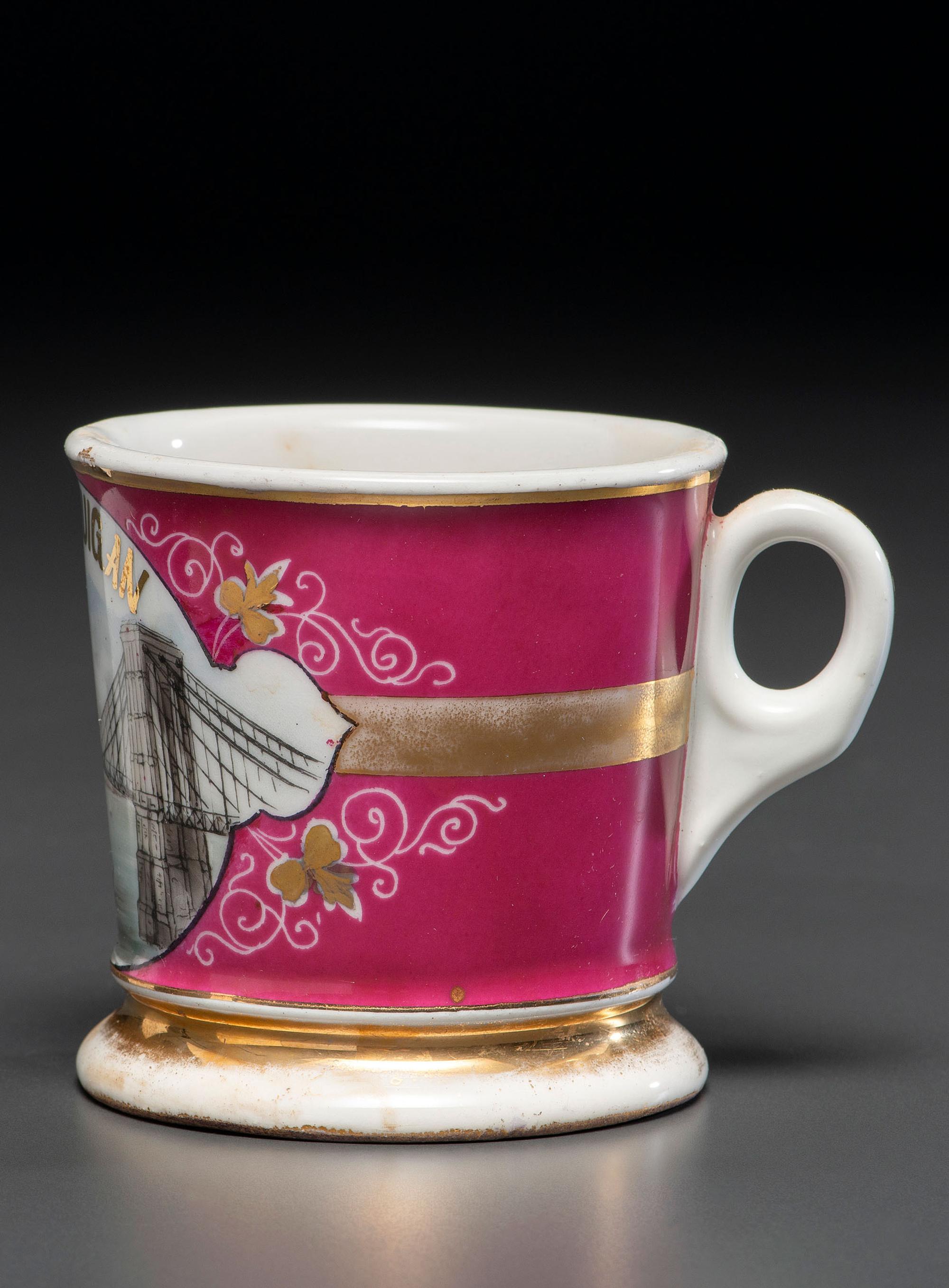 A Porcelain Shaving Mug Depicting The Brooklyn Bridge