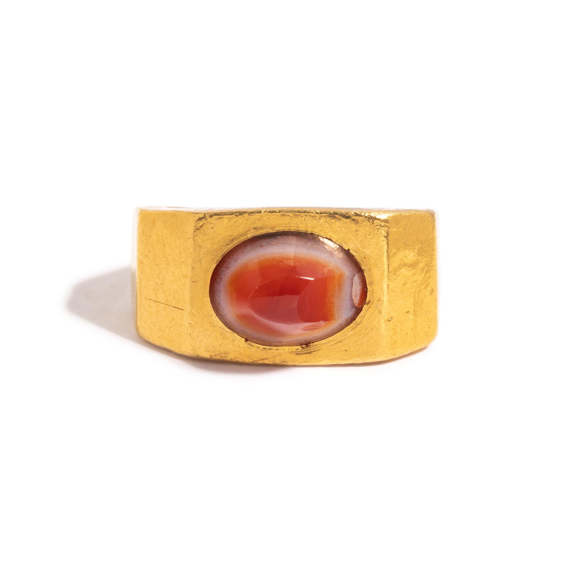 A Roman Gold and Banded Carnelian Cabochon Finger Ring