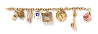 A 14 Karat Yellow Gold Charm Bracelet with Eight Attached Charms, 42.10 dwts.