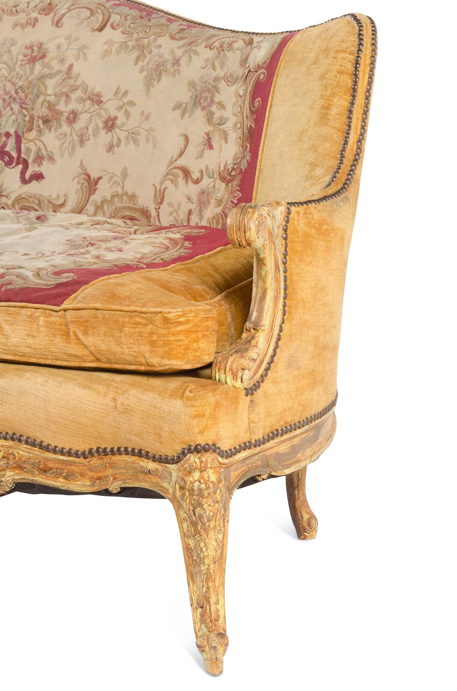 A Louis XV Painted Sofa with Aubusson Tapestry Upholstery