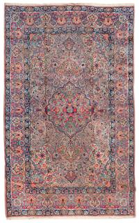 A Kirman Wool Rug 8 feet 10 inches x 5 feet 9 inches. — CIRCA 1910