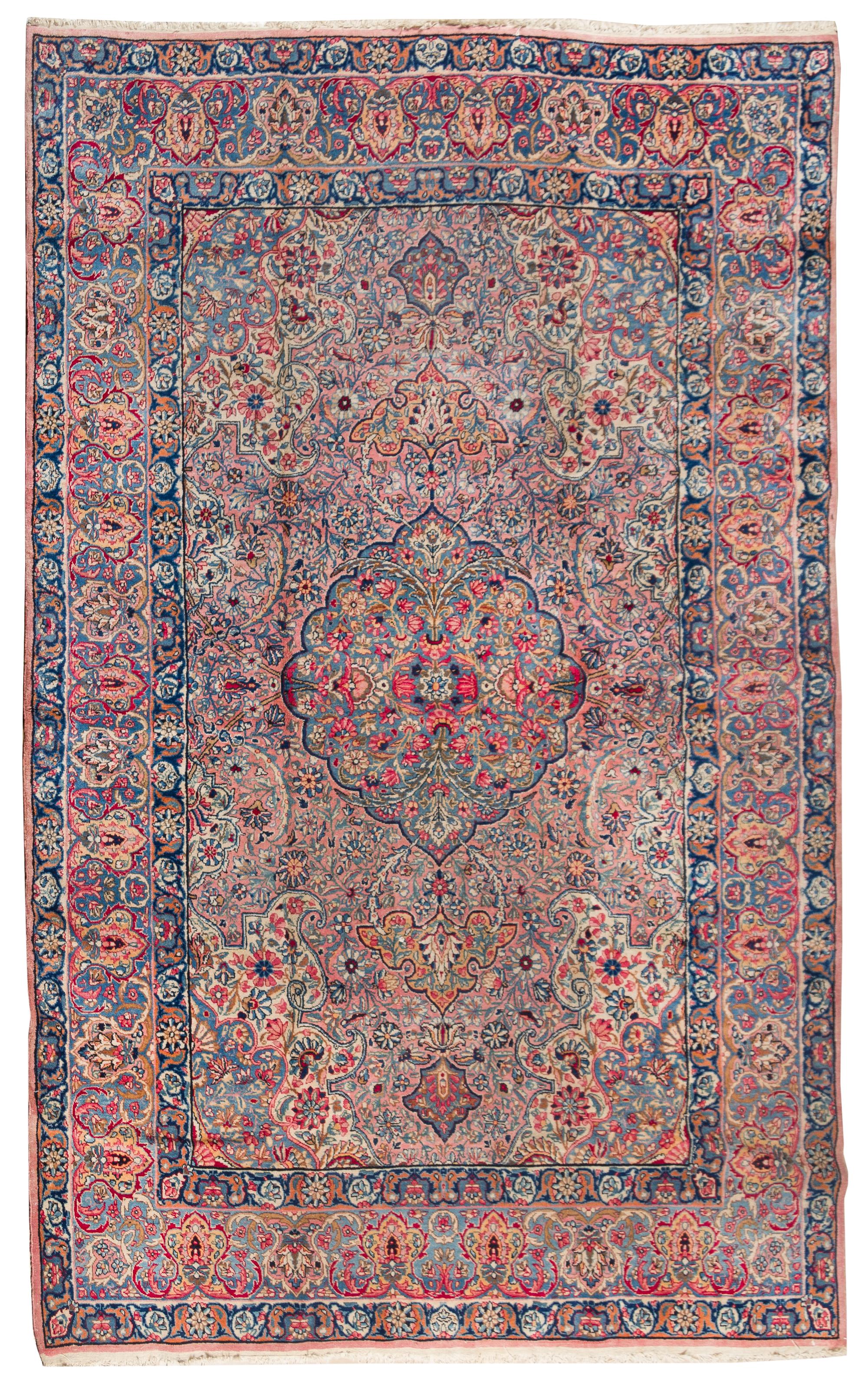 A Kirman Wool Rug 8 feet 10 inches x 5 feet 9 inches. — CIRCA 1910