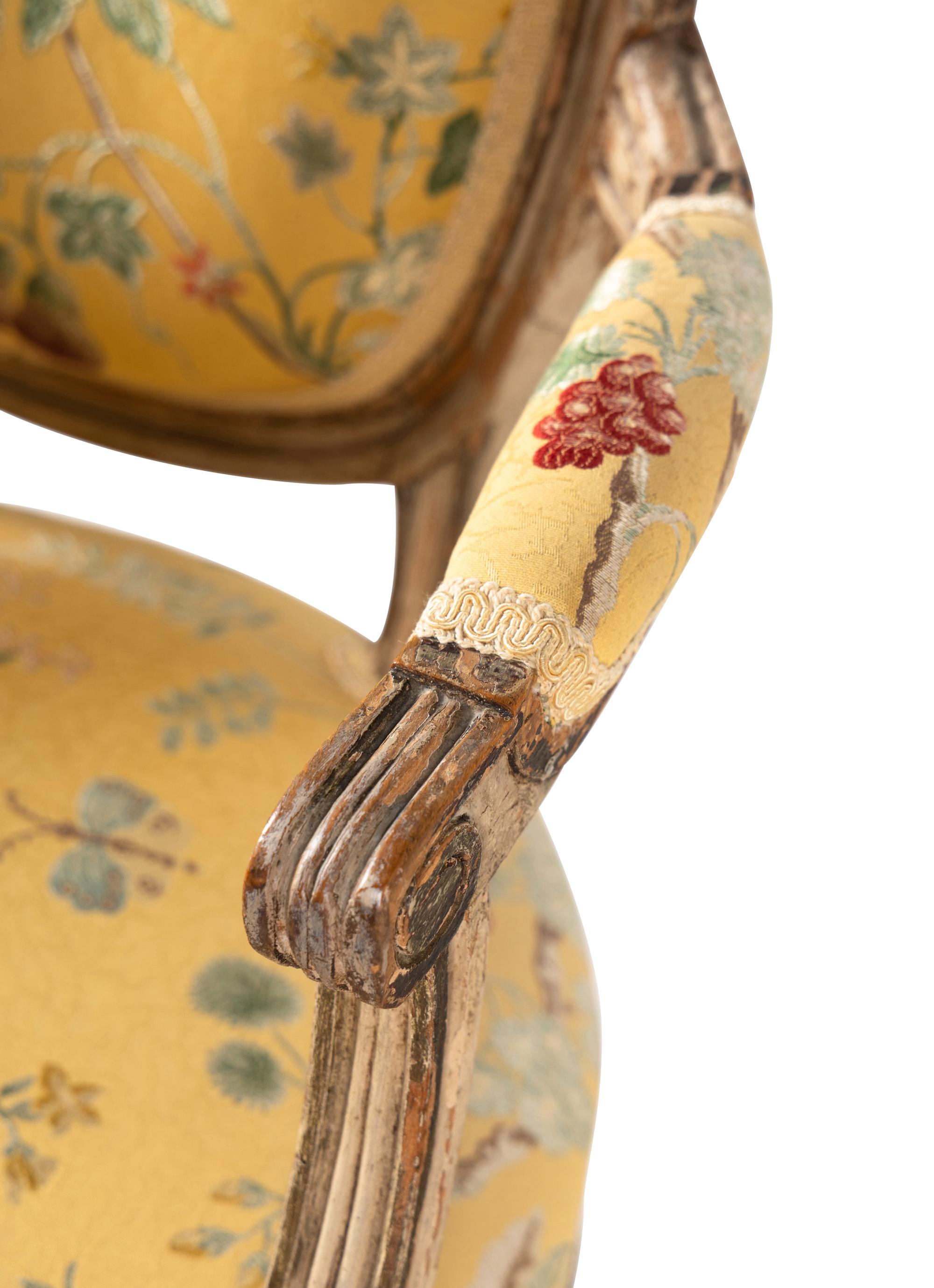 A Pair of Louis XVI Painted Fauteuils