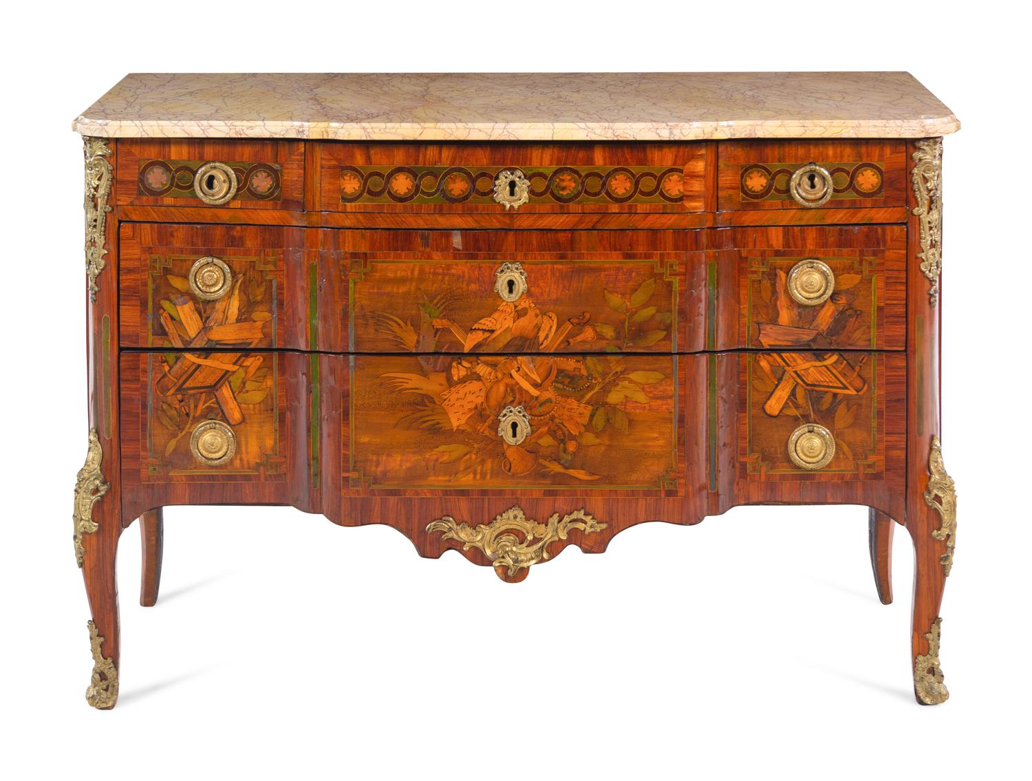 A Louis XV/XVI Transitional Style Gilt Metal Mounted and Sans Traverse Marquetry Marble-Top Commode