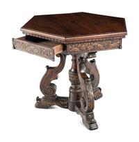 A Continental Parcel Gilt Beechwood and Olivewood Center Table