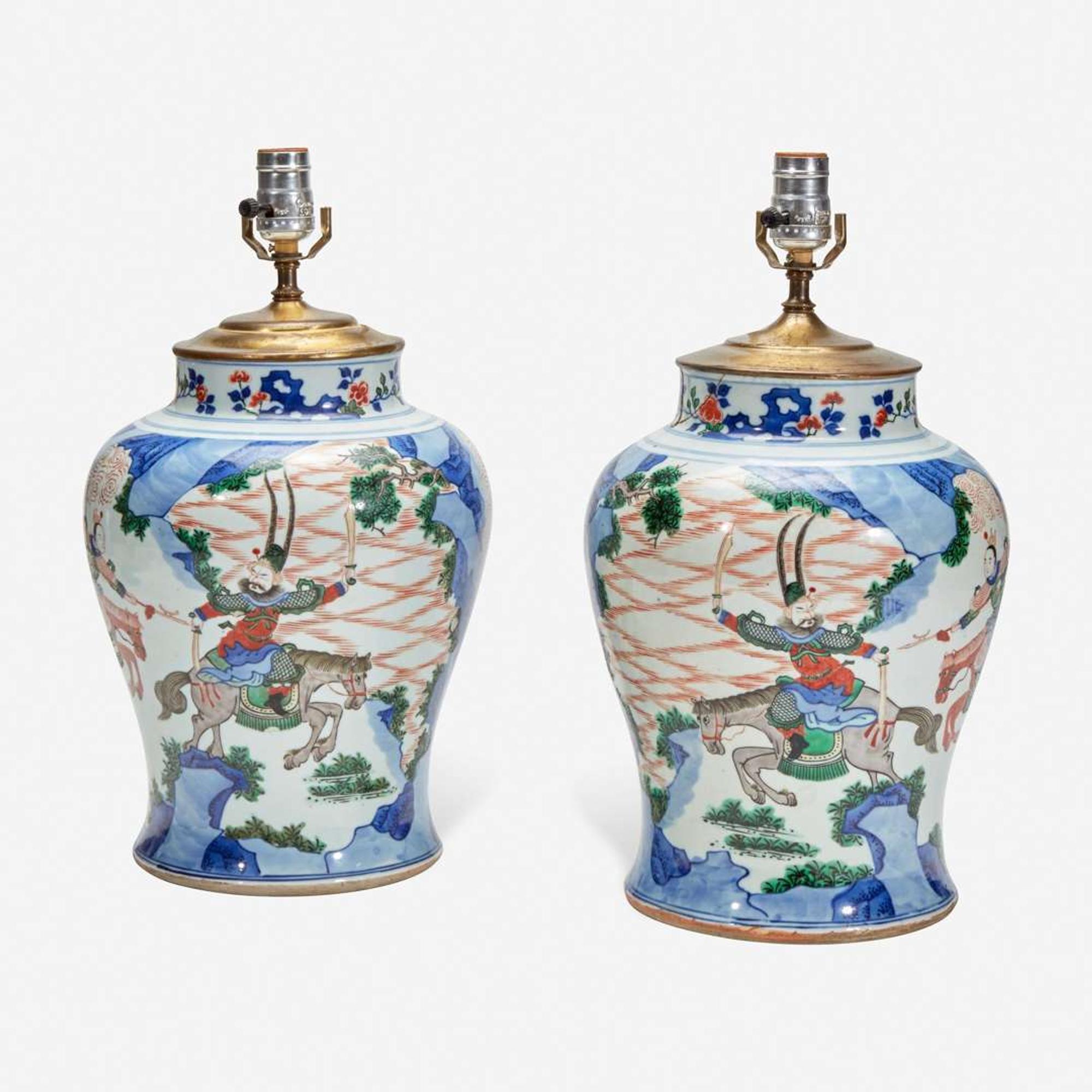 A pair of large Chinese wucai-decorated porcelain jars, mounted as lamps