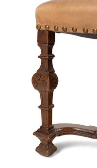 A Set of Twelve Spanish Baroque Style Dining Chairs