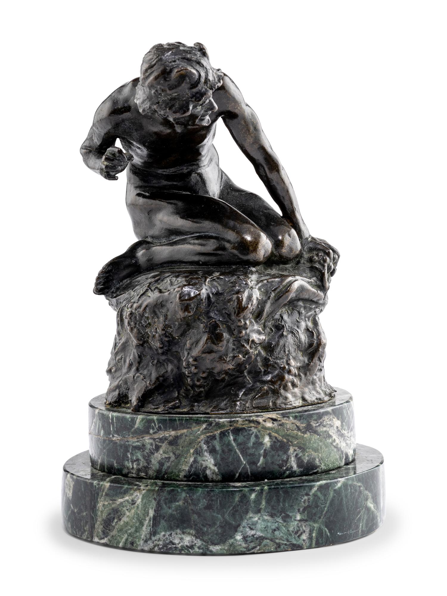 A Bronze Figure of Satyr on the Rocks