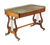 A Regency Brass Mounted Rosewood and Rosewood Grained Writing Table