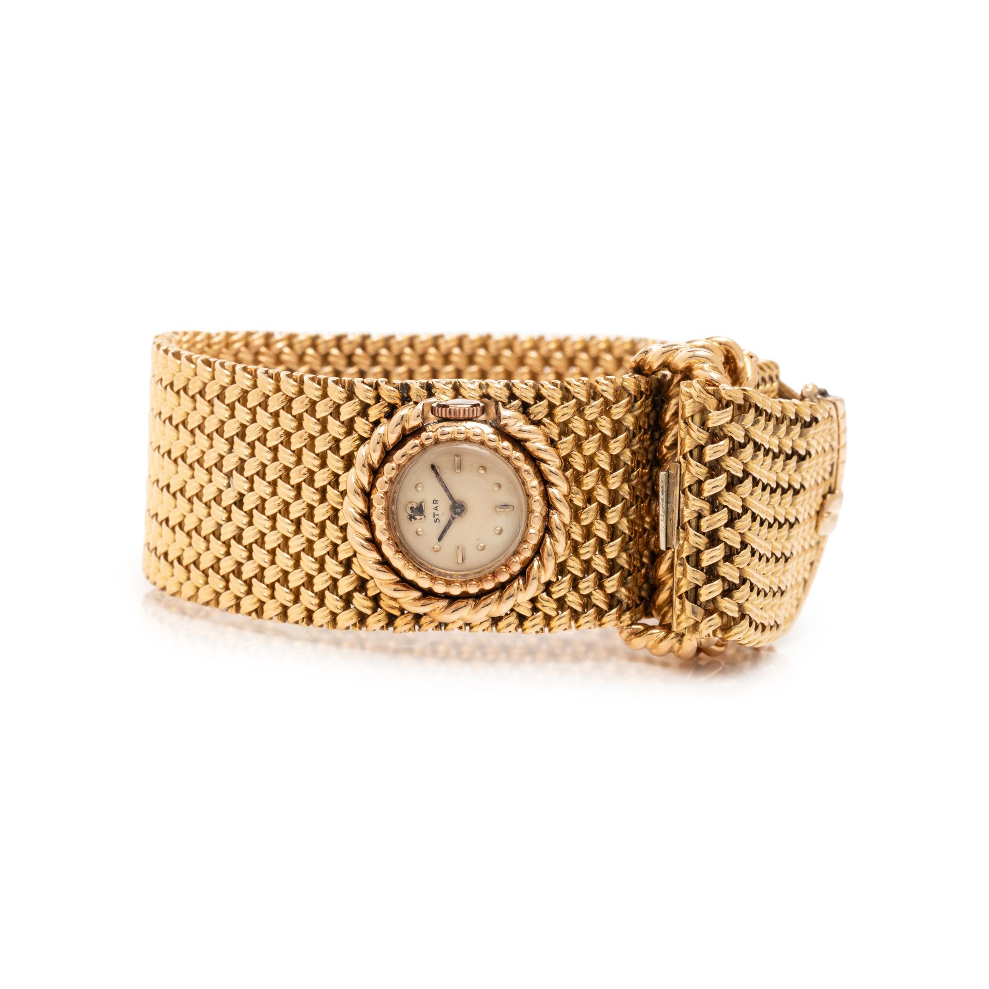 FRENCH, GOLD AND DIAMOND SURPRISE WATCH