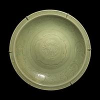 A Chinese Longquan Celadon Glazed Porcelain Charger, Ming Dynasty 明 龍泉窯刻花大盤