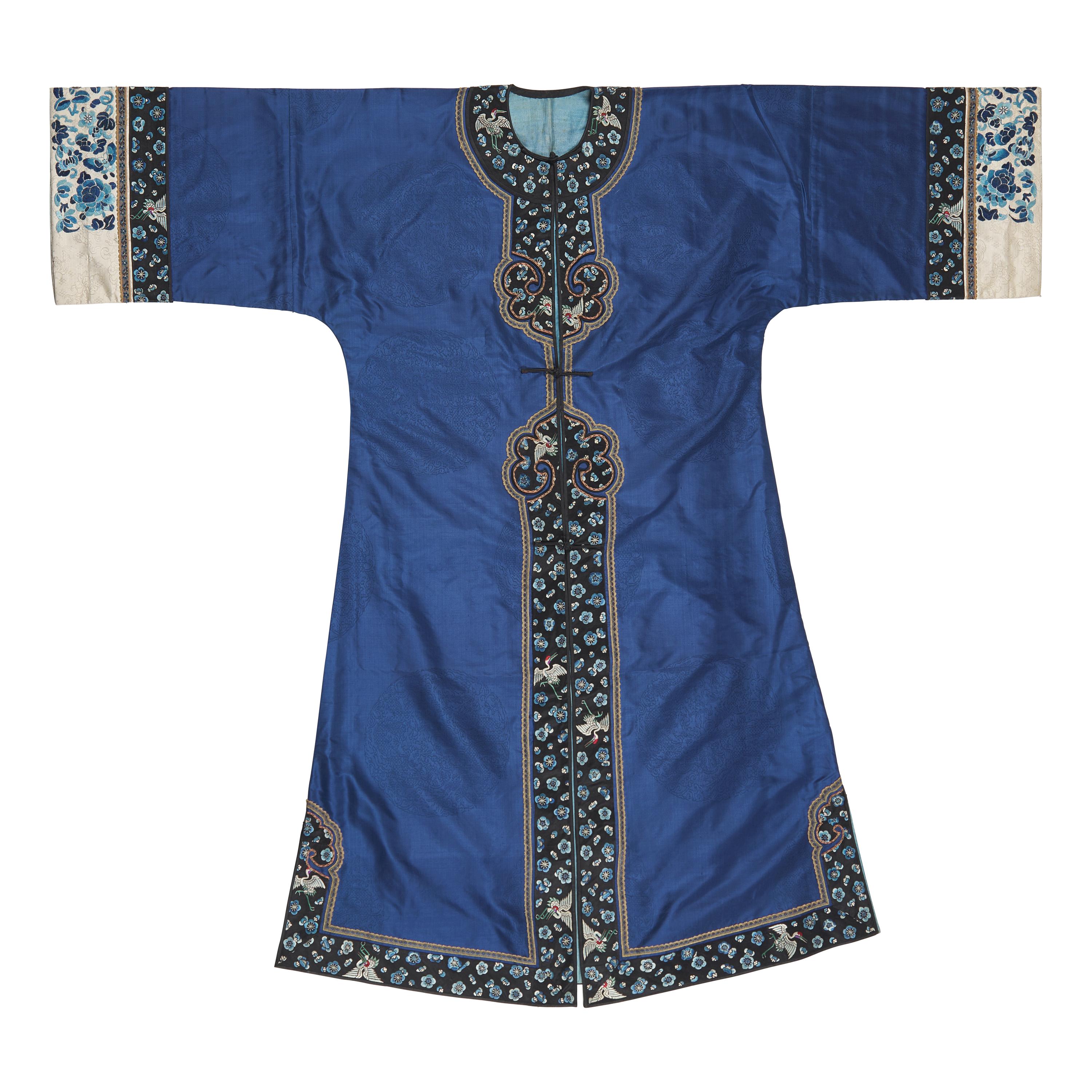A Chinese Blue Silk Lady's Jacket, Late 19th-Early 20th Century 晚清-民國 藍地團龍紋鑲仙鶴梅花邊女褂