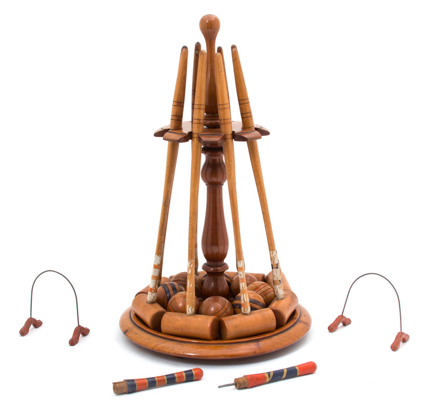 An English Table Croquet Set Height 14 1/2 inches. — LATE 19TH CENTURY