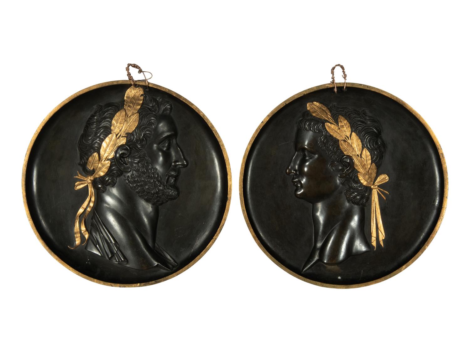 A Pair of Continental Patinated and Parcel Gilt Bronze Plaques of Roman Emperors