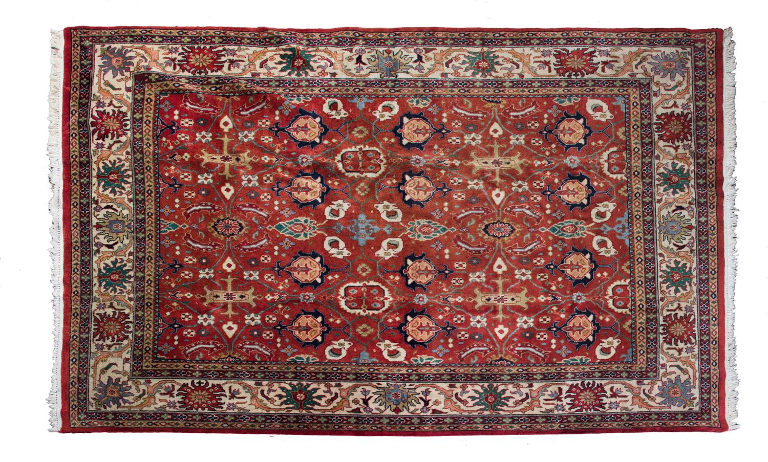 A Heriz Wool Rug 9 feet 10 inches x 6 feet 8 inches.