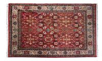 A Heriz Wool Rug 9 feet 10 inches x 6 feet 8 inches.