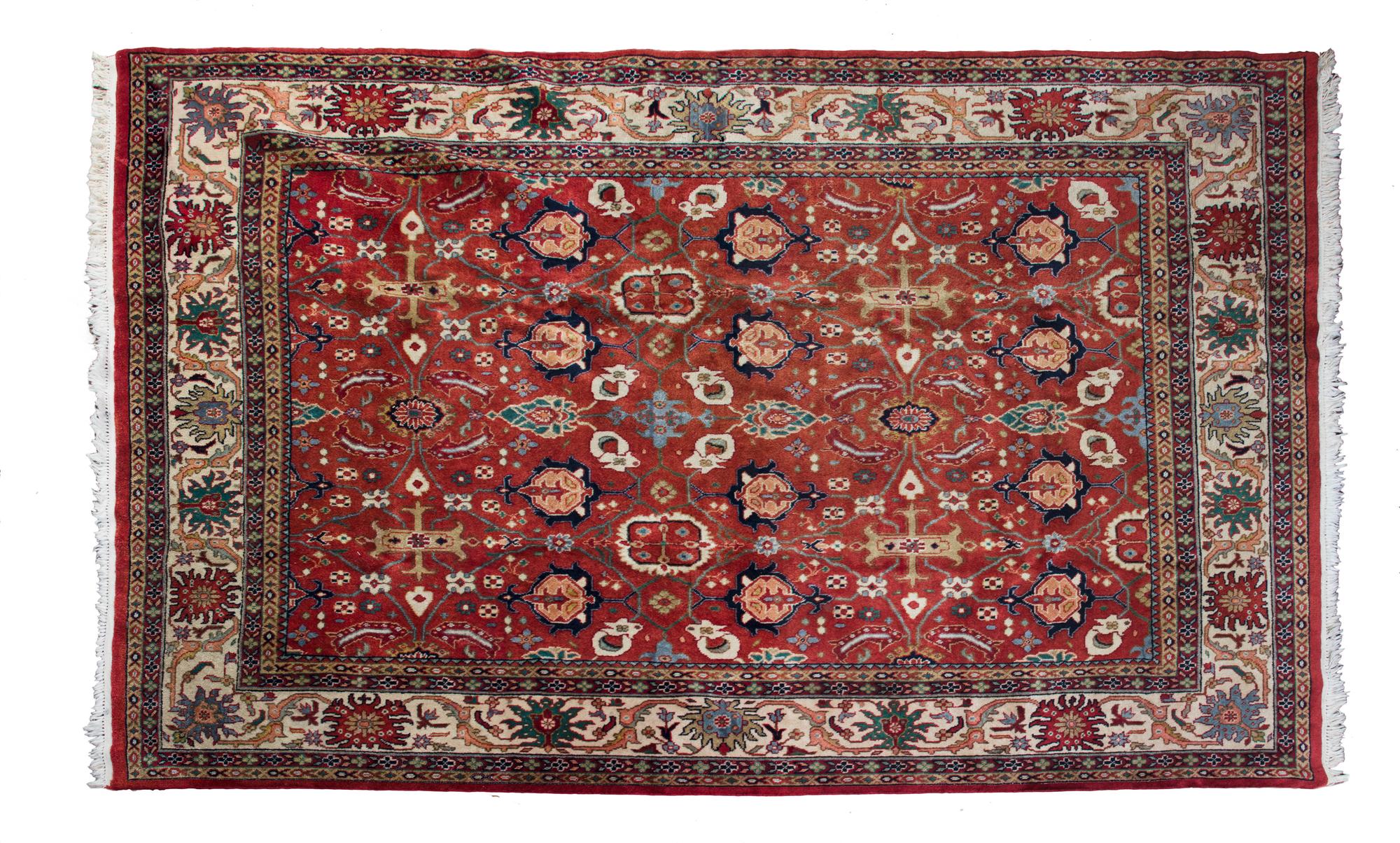 A Heriz Wool Rug 9 feet 10 inches x 6 feet 8 inches.