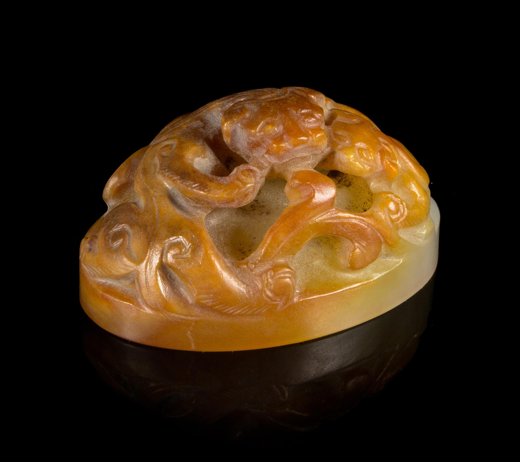 A Celadon and Russet Jade Seal Length 2 inches.