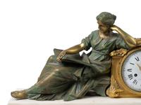 A French Empire Bronze, Gilt Bronze and Marble Figural Mantle Clock — 19TH CENTURY