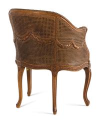A Louis XVI Style Carved Beechwood and Caned Bergère