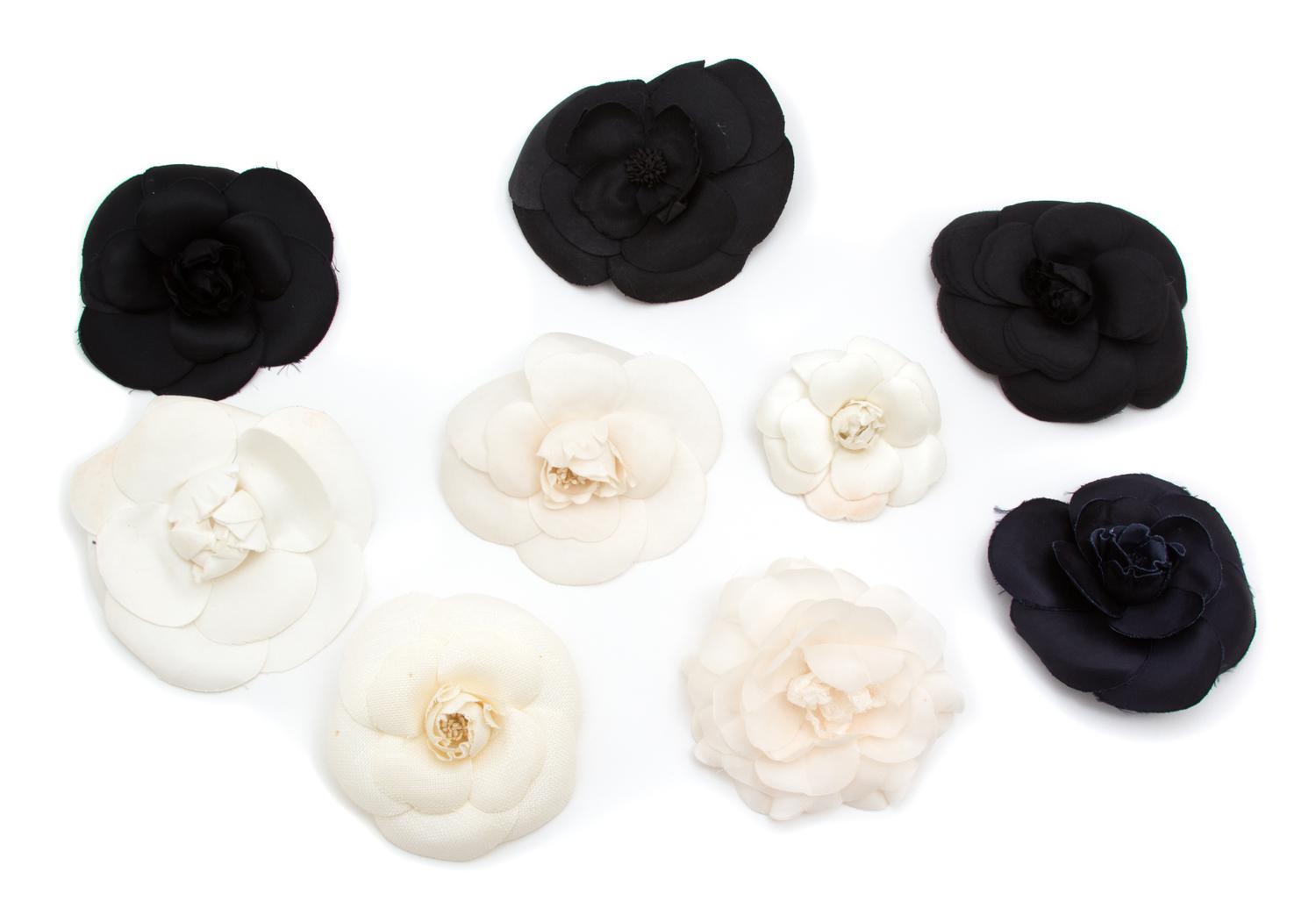 A Group of Nine Chanel Camellia Brooches, 4" - 5" diameter.