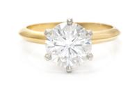 An 18 Karat Yellow Gold, Platinum and Diamond Solitaire Ring, Tiffany & Co., 2.60 dwts.