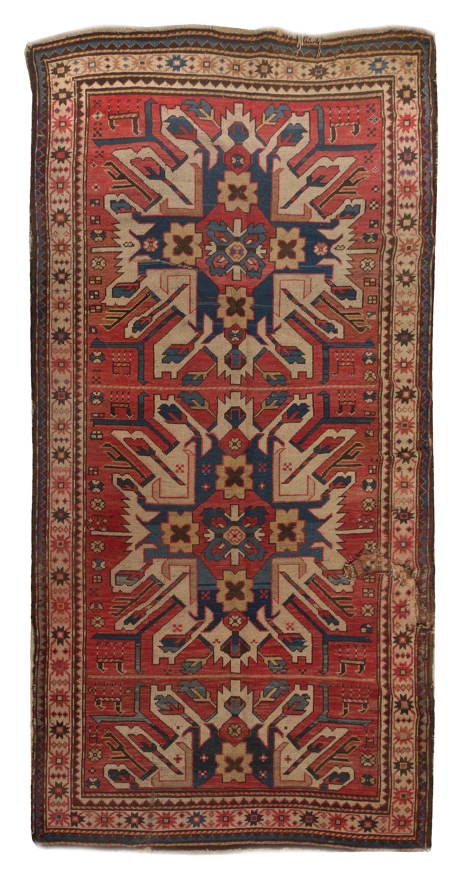 A Caucasian Wool Rug, 8 feet 7 inches x 4 feet 3 inches.